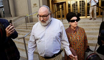 File photo: Convicted spy Jonathan Pollard and his wife, Esther leave the federal courthouse in New York. 