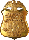 Badge of a Federal Bureau of Investigation special agent.png
