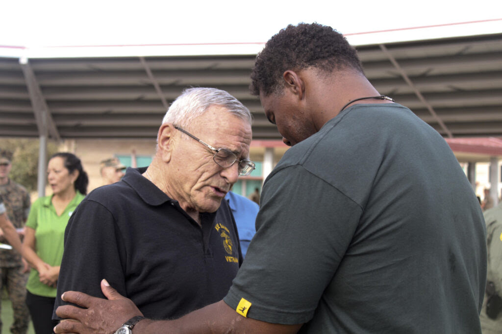 Herschel Walker speaks to Wounded Warrior Battalion about mental health