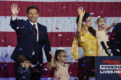 Florida Gov. Ron DeSantis gives a victory speech flanked by his wife Casey DeSantis and his children in Tampa, Florida.