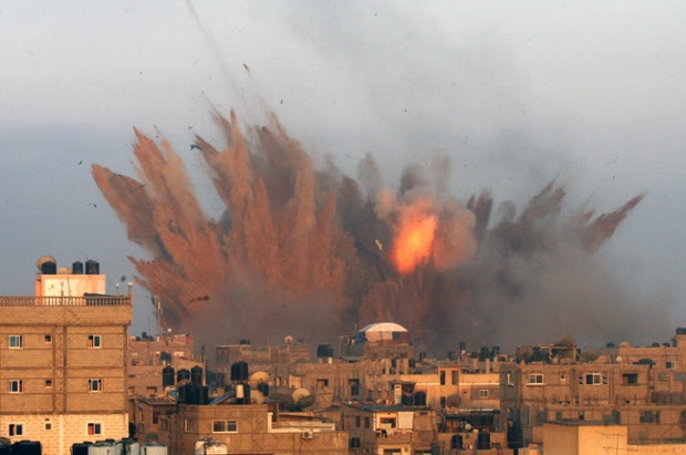 A ball of fire is seen following an Israeli air strike in Rafah, in the southern of Gaza Strip.