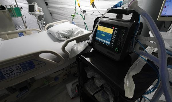 Ventilators sit beside each of the five intensive care beds that are part of the 32-bed Samaritan&#39;s Purse Emergency Field Hospital set up in one of the University of Mississippi Medical Center&#39;s parking garages, Tuesday, Aug. 17, 2021, in Jackson, Miss. The field hospital joins a 20-bed field hospital and monoclonal antibody clinic opened by the U.S. Department of Health and Human Services at UMMC in response to the rising number of COVID-19 cases in the state. (AP Photo/Rogelio V. Solis)