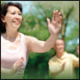 older couple doing tai chi