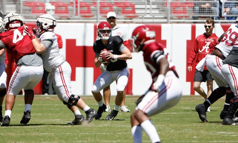 Alabama QB Ty Simpson (#15) attempting to pass during 2022 Spring Football Practice