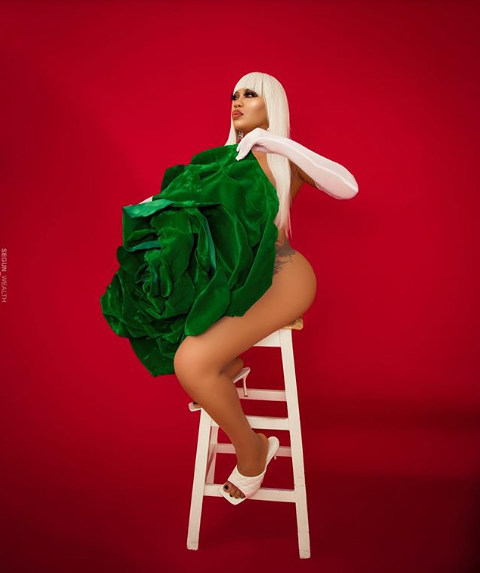 Toyin Lawani barely covers her naked body with a giant green flower to celebrate Nigeria