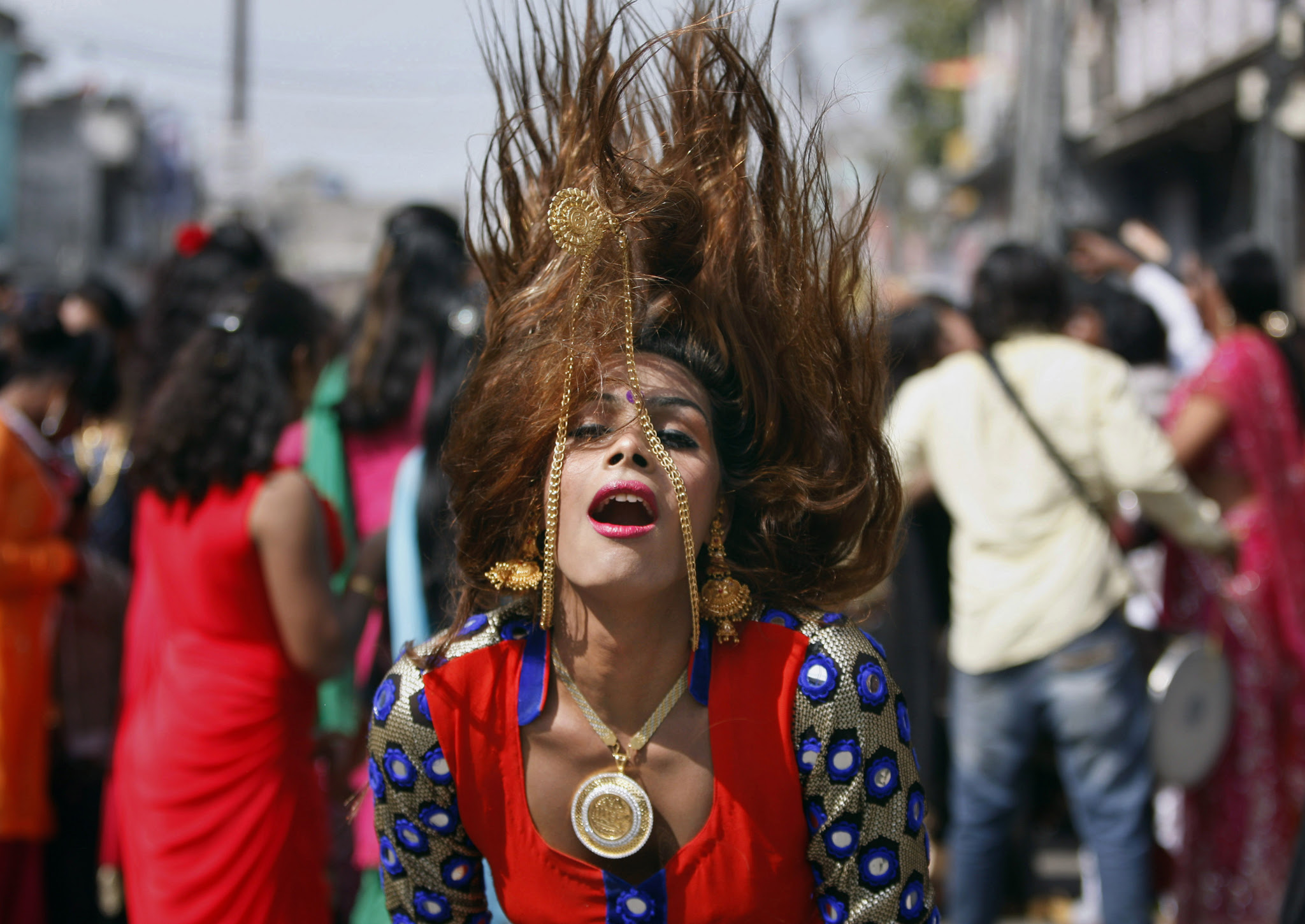 A eunuch dances during a rally to mark the congregation of thousands of eunuchs from different parts of India, in Jammu, India,