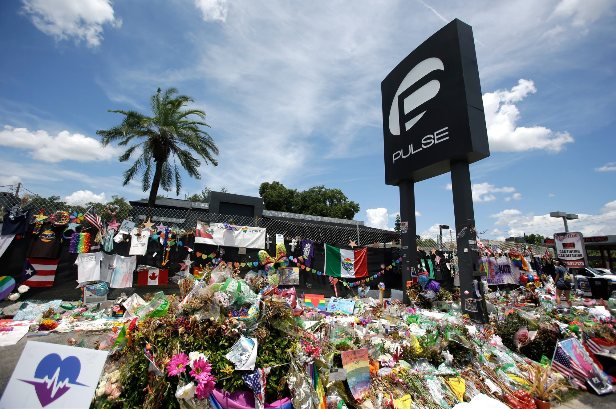 Hundreds of memorial items left outside of the Pulse nightclub in Orlando, Florida 