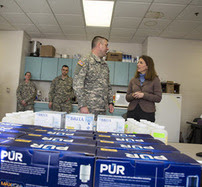 Secretary Burwell and National Guard member in Flint