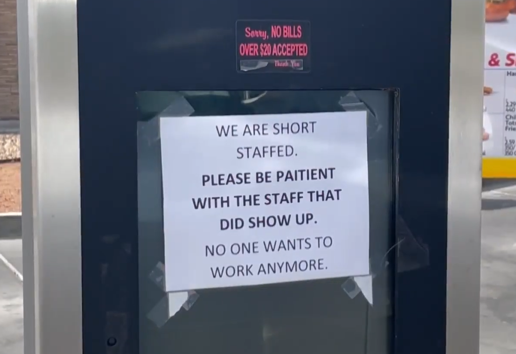 Sign that says ''We are short staffed. Please be patient with the staff that did show up. No one wants to work anymore.''