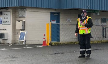 Photo of terminal employee directing traffic at Fauntleroy terminal