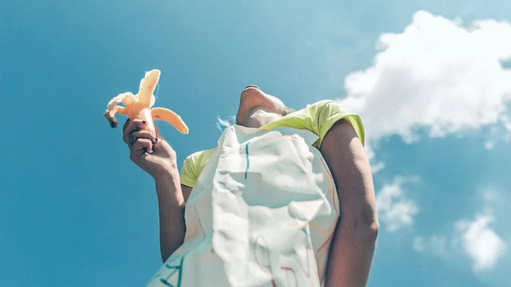 person eating a banana