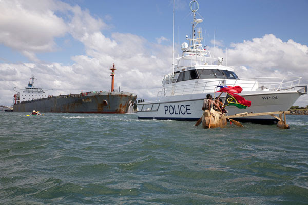 Police clear The Warriors out of the way of the coal ship