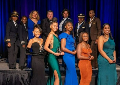 Sisters of the Skies recipients of the Boeing Pilot Training Scholarship pose after receiving their scholarships. (Terrence Bowen Photography)