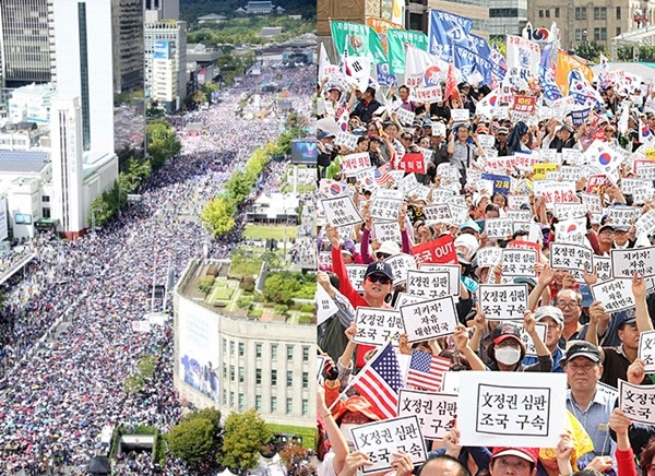 10월3일 개천절을 기해 서울 도심에서 열린 10.3 국민총궐기 당시 집회 인파와 참여자들의 피켓팅 모습.(사진=자유한국당 제공)