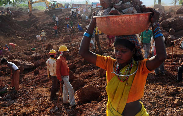Baiga work in terrible conditions in the Bodai-Daldali bauxite mine, Chhattisgarh. Having once lived sustainable lives in the forests, they now endure exploitation and poverty after eviction from their land.