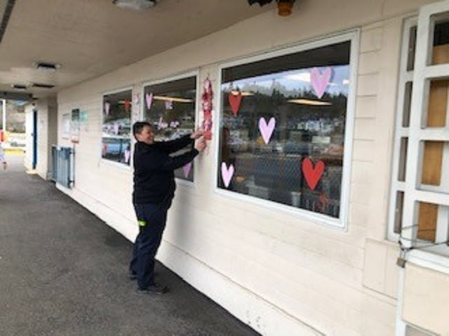 Person hanging up decorations