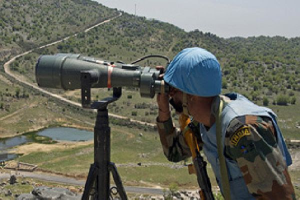 UNIFIL peacekeeper in an observation post watching over the Blue Line at the UNIFIL Indian position 4-7c near the mountain town of Cheeba, South Lebanon.