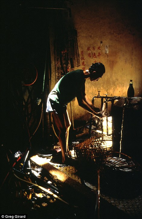 A resident uses the only remaining natural ground well, although people were advised not to drink the water