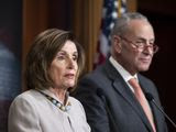 FILE - In this Tuesday, Feb. 11, 2020, file photo, House Speaker Nancy Pelosi, of California, joined by Senate Minority Leader Chuck Schumer of N.Y., speaks during a news conference, on Capitol Hill, in Washington. The two lawmakers are calling on President Donald Trump to support a series of steps to help Americans deal with the coronavirus outbreak, from paid sick leave to widespread and free testing and other moves. (AP Photo/Alex Brandon, File)