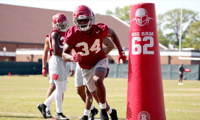 Quandarrius Robinson (No. 34) going through drills in Alabama spring practice