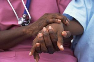 Nurse and child hands