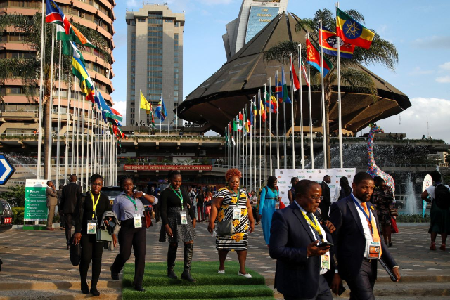 Delegates walk outside the Kenyatta International Convention Centre (KICC) during the first day of Africa Climate Summit (ACS) 2023 in Nairobi, Kenya, September 4, 2023