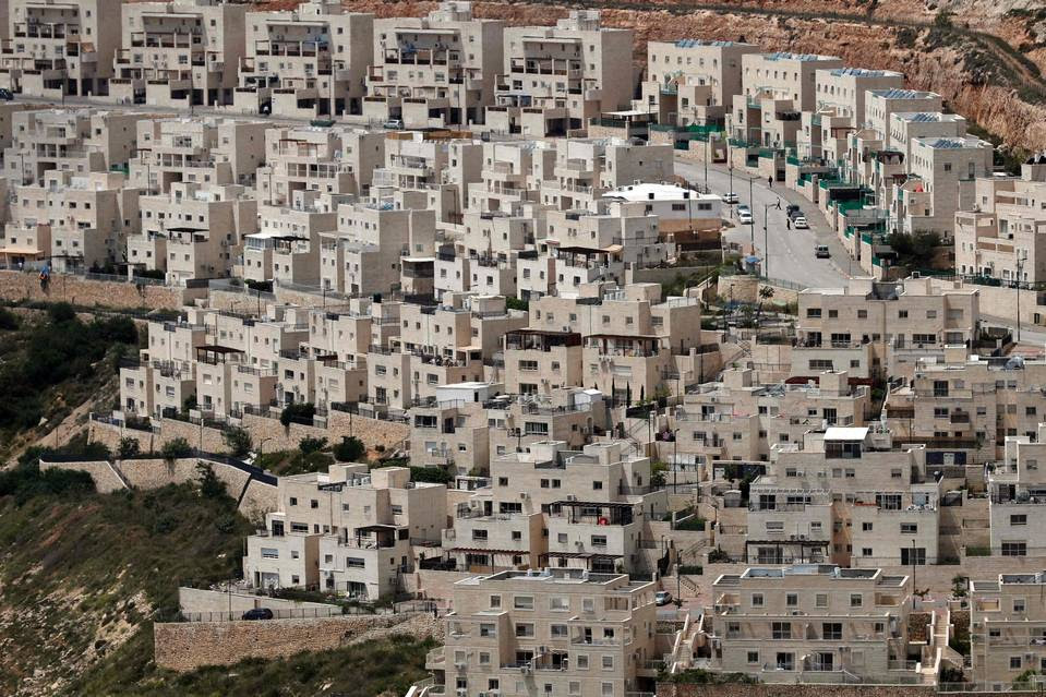 A photo taken in April shows a partial view of the Israeli settlement of Givat Zeev near the West Bank city of Ramallah. 