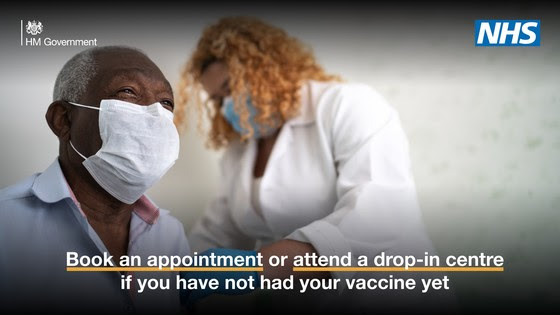 Man receives vaccination. Caption reads Book an appointment or attend a drop-in centre if you have not had your vaccine yet