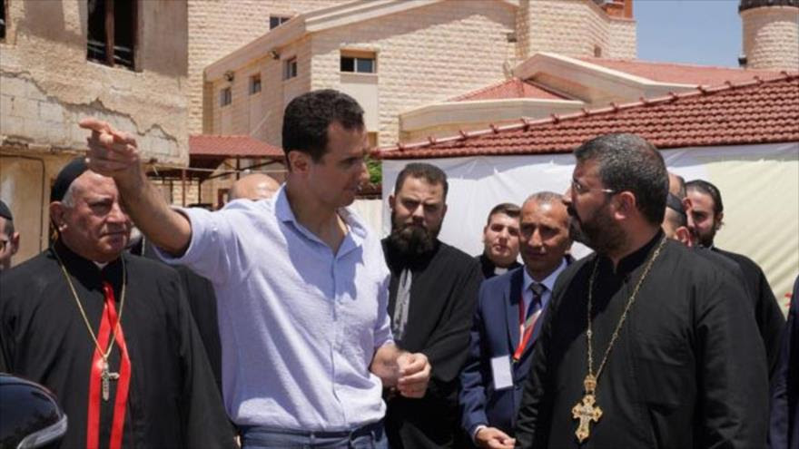 El presidente sirio, Bashar al-Asad, acompañado por los cristianos de la ciudad de Saydnaya, al noroeste de Damasco, capital.