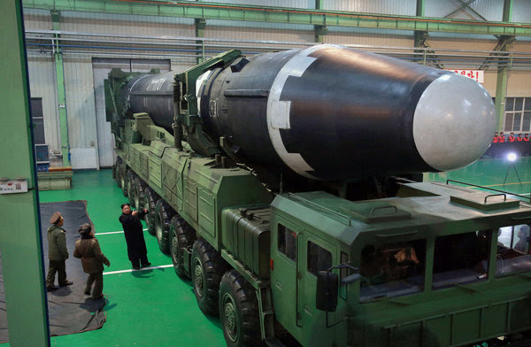 Kim Jong-un, the North Korean leader, with the Hwasong-15 missile in a photo released by the government news agency in November.