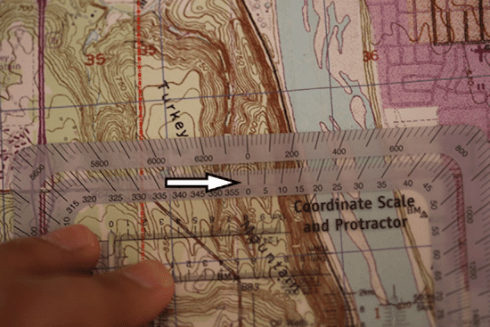 shooting bearings with protractor on topo topographic map