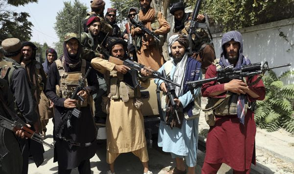 Taliban fighters pose for a photograph in Kabul, Afghanistan, Thursday, Aug. 19, 2021. The Taliban celebrated Afghanistan&#39;s Independence Day on Thursday by declaring they beat the United States, but challenges to their rule ranging from running a country severely short on cash and bureaucrats to potentially facing an armed opposition began to emerge. (AP Photo/Rahmat Gul)