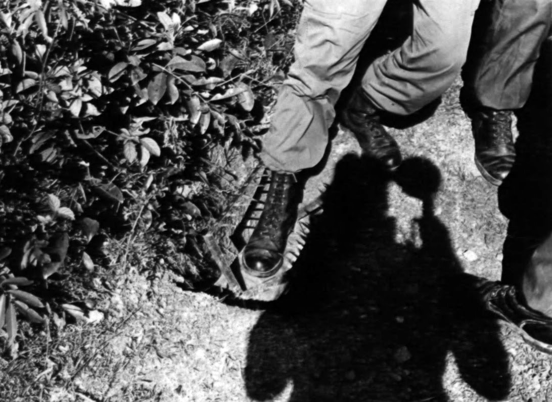 Man demonstrating a foot trap in Vietnam