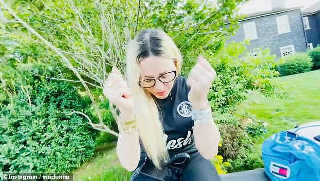 Support: Madonna was every inch the proud parent as she shared a video of her son David Banda scoring a goal during a game of soccer