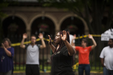 Protesters chanted “Hands up, don’t shoot” outside of the governor’s mansion in St. Paul on Thursday after the fatal police shooting of Philando Castile.