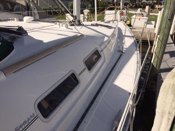 Spinnaker flying at the Dock