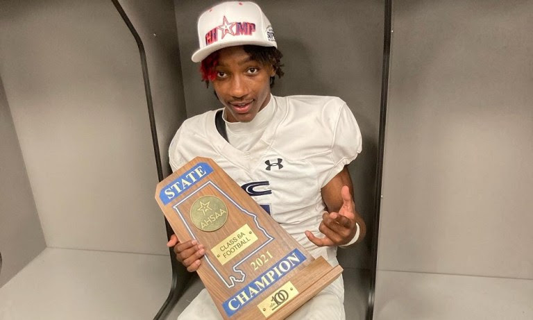 Mario Craver poses for picture after state champiosnhip win
