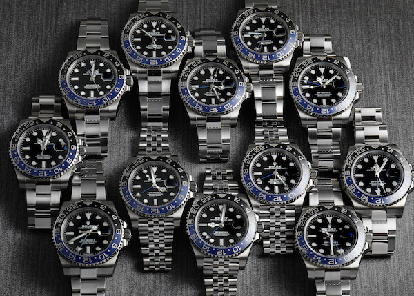 A lineup of Rolex GMT Master II Batman models with Oyster and Jubilee bracelets