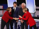 Sen. Amy Klobuchar, D-Minn., from left, South Bend Mayor Pete Buttigieg, Sen. Bernie Sanders, I-Vt., and Sen. Elizabeth Warren, D-Mass., greet each other before the first of two Democratic presidential primary debates hosted by CNN Tuesday, July 30, 2019, in the Fox Theatre in Detroit. (AP Photo/Paul Sancya) ** FILE **