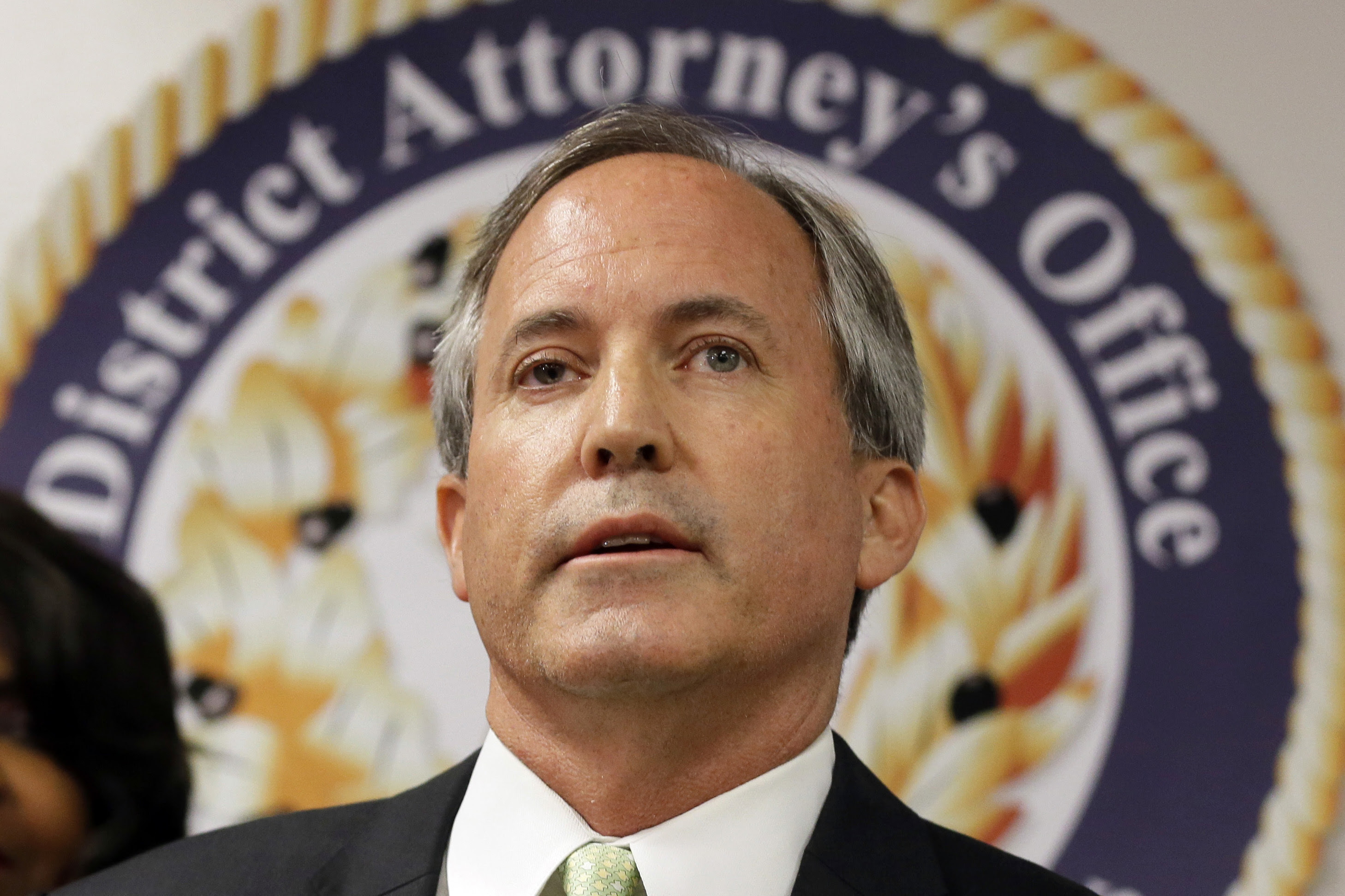 Texas Attorney General Ken Paxton speaks at a news conference in Dallas on June 22, 2017.