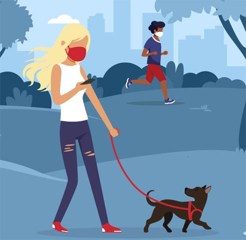 Teen with mask walking dog in park and teen running in background