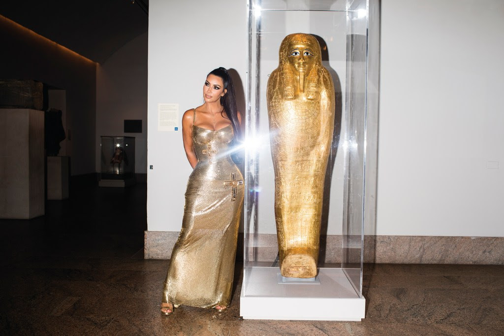 Kim Kardashian — clad in gold — posed alongside the Coffin of Nedjemankh at the 2018 Met Gala.