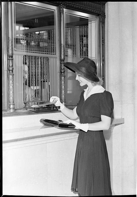Woman At Bank Teller Window woman at bank teller window