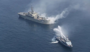 Two warships flying Iranian colors are sailing south and may be headed to Venezuela
