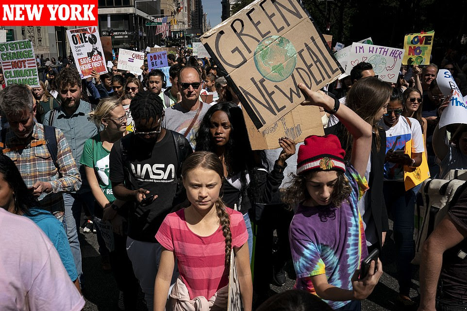 Led by climate activist Greta Thunberg (centre), young activists and their supporters rally for action on climate change in New York City today
