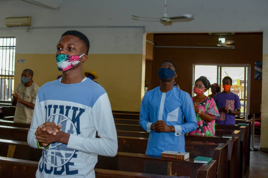 Christians adorn facemask and observe social distancing as churches in Lagos reopen for service (photos)
