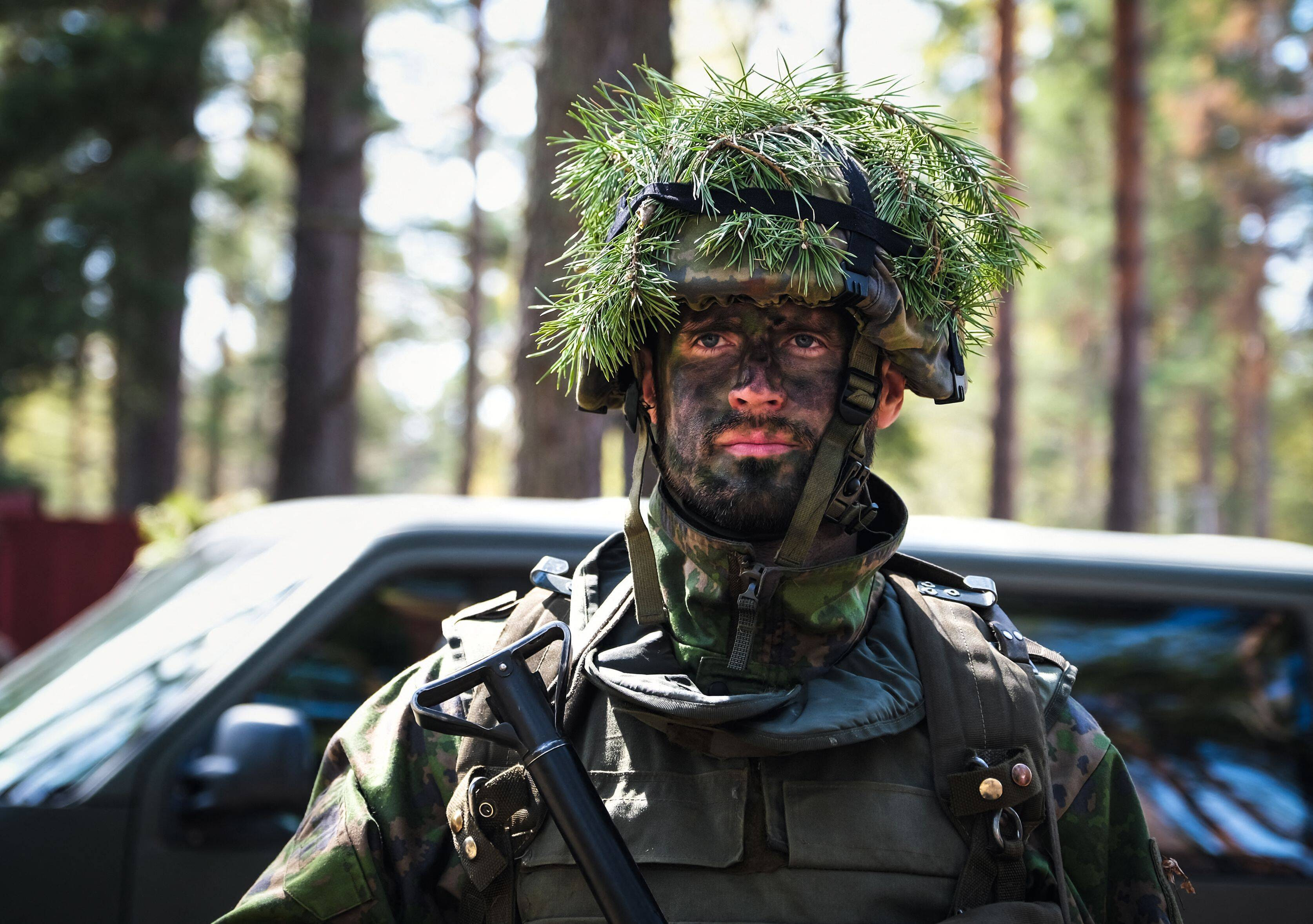 Members of the MPK, the National Defense Training Association of Finland, attend an exercise at the Santahamina military base in Helsinki on May 14. (Alessandro Rampazzo/AFP/Getty Images)