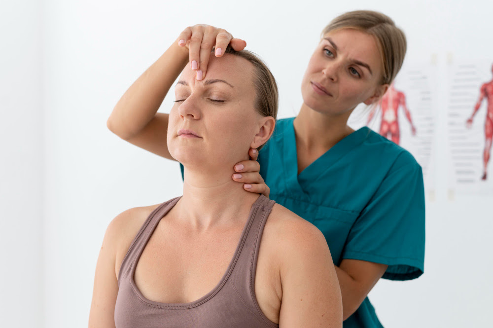 physiotherapist-helping-patient-her-clinic-1.jpg
