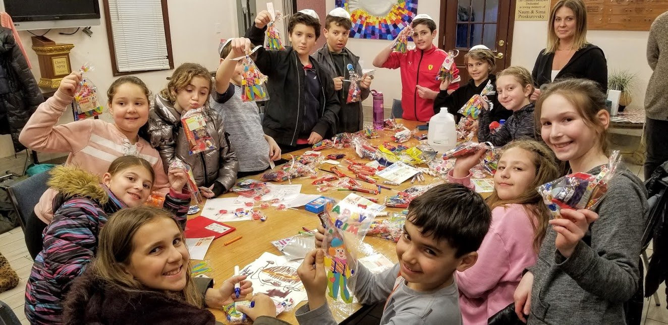 Jewish Kids Club of Hewlett, an after-school program for fourth- and fifth-graders at the Chabad of Hewlett, put together Purim packages for IDF soldiers and children at the Mishpacha Jewish Orphanage in Odessa, Ukraine.