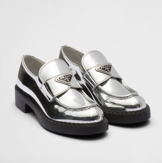 buttongroup  Comprar en Prada...